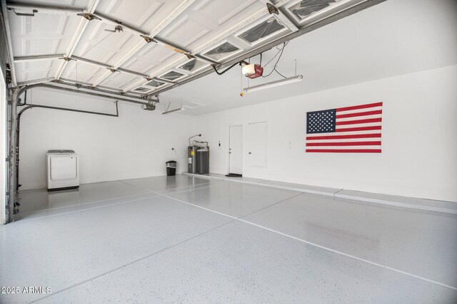 13629 N 71st Dr, Peoria, AZ 85381 - garage featuring a garage door opener, electric water heater, and washer / dryer