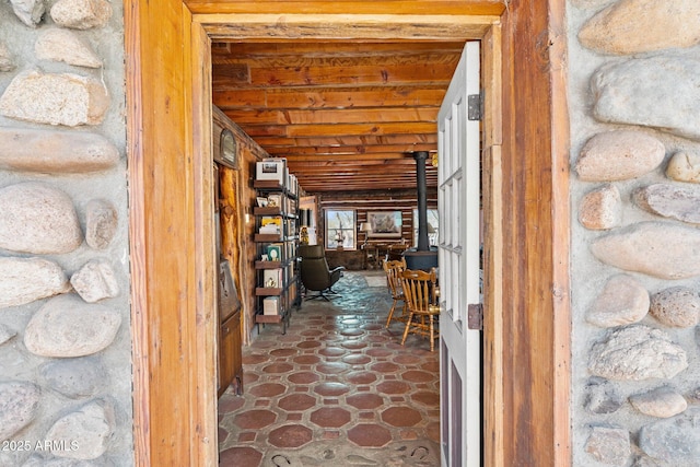 hall featuring wood ceiling