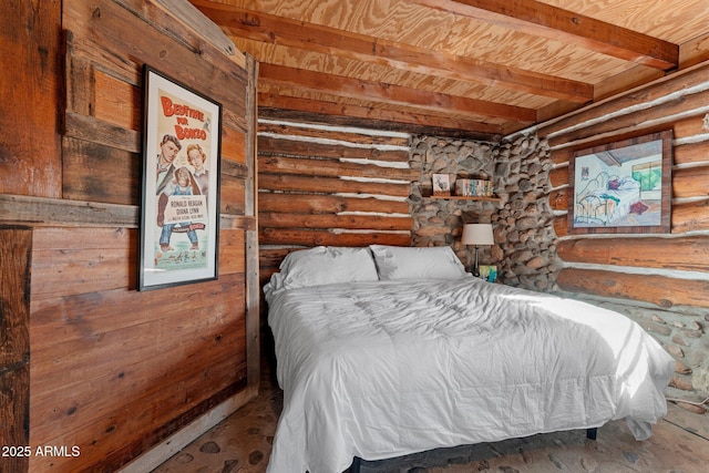 bedroom featuring beam ceiling, wooden ceiling, and rustic walls