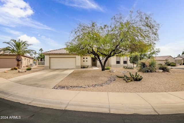 view of front of property featuring a garage