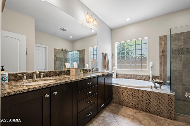 3766 E Ringtail Way, Phoenix, AZ 85050 - bathroom with a shower stall, a garden tub, double vanity, tile patterned flooring, and recessed lighting