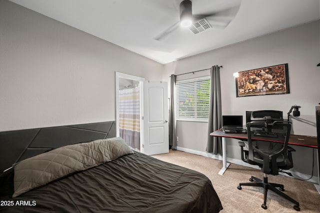 3766 E Ringtail Way, Phoenix, AZ 85050 - carpeted bedroom with an office area, a ceiling fan, and connected bathroom