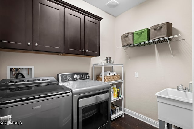 3766 E Ringtail Way, Phoenix, AZ 85050 - laundry room with washer and dryer, cabinet space, and dark wood-style floors