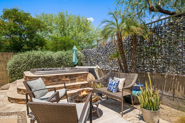 3766 E Ringtail Way, Phoenix, AZ 85050 - view of patio with a fire pit