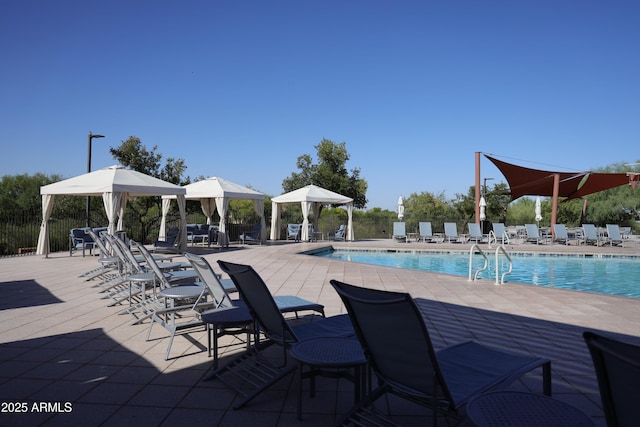 3766 E Ringtail Way, Phoenix, AZ 85050 - community pool featuring a gazebo and a patio area