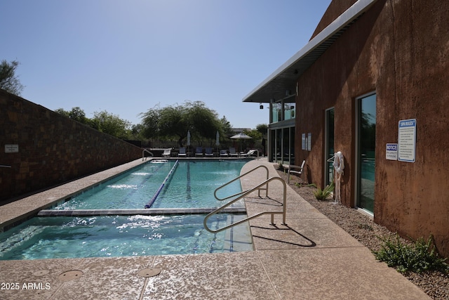 3766 E Ringtail Way, Phoenix, AZ 85050 - community pool with a patio area