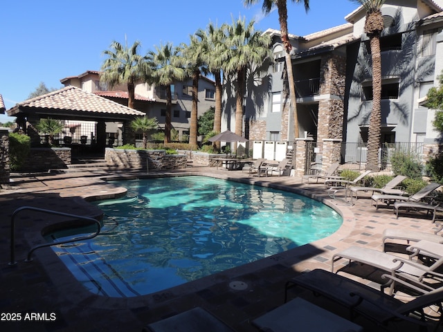 2025 E Campbell Ave Unit 120, Phoenix, AZ 85016 - community pool featuring a patio area and a gazebo