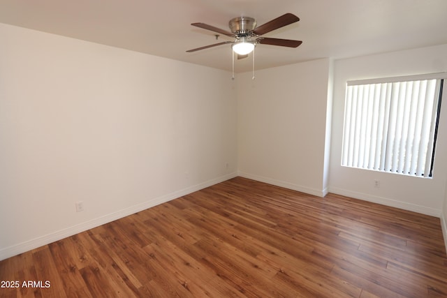 2025 E Campbell Ave Unit 120, Phoenix, AZ 85016 - empty room featuring ceiling fan and wood finished floors
