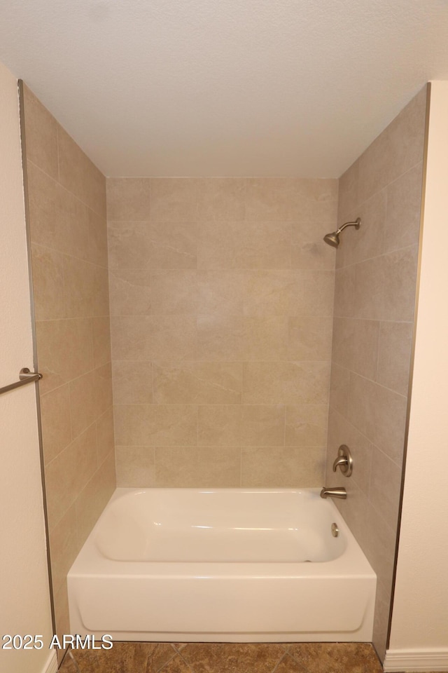 2025 E Campbell Ave Unit 120, Phoenix, AZ 85016 - bathroom with bathtub / shower combination and tile patterned floors