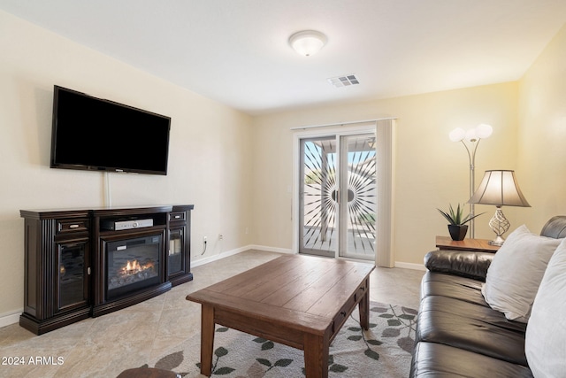 living room featuring light tile patterned flooring