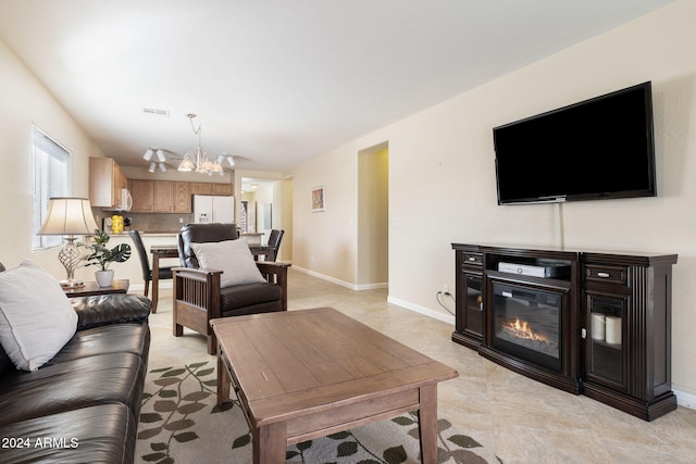 living room with a chandelier