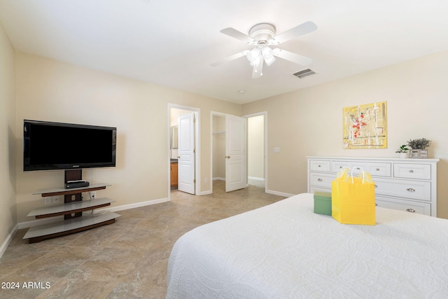 bedroom with ceiling fan and ensuite bathroom