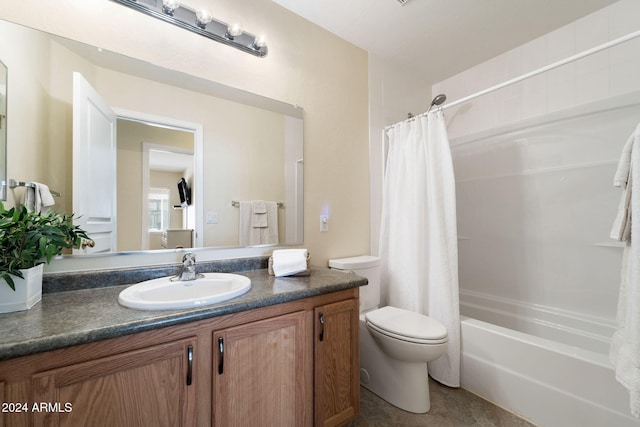 full bathroom with shower / tub combo with curtain, vanity, and toilet