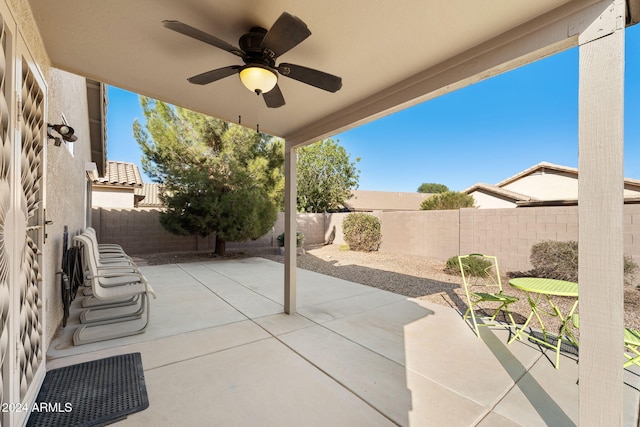 view of patio featuring ceiling fan