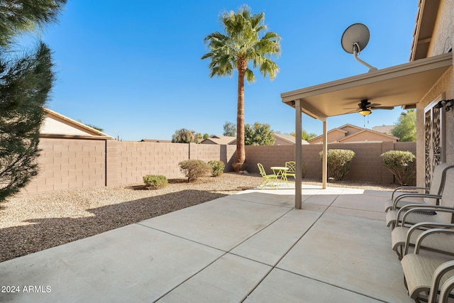 view of patio / terrace featuring ceiling fan