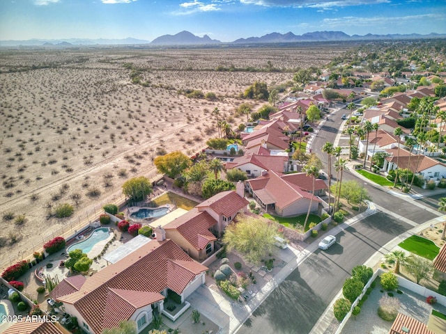 bird's eye view with a mountain view