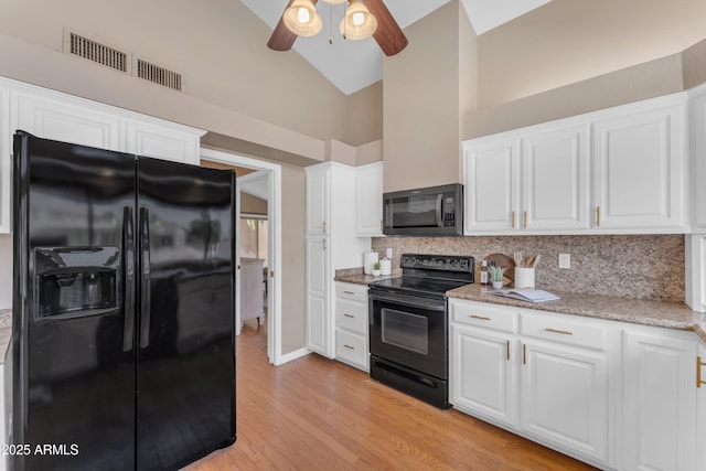 5822 W Abraham Ln, Glendale, AZ 85308 - kitchen featuring black appliances, a ceiling fan, high vaulted ceiling, tasteful backsplash, and white cabinets