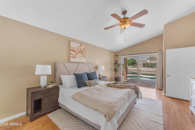 5822 W Abraham Ln, Glendale, AZ 85308 - bedroom featuring access to outside, vaulted ceiling, light wood-style flooring, and a ceiling fan