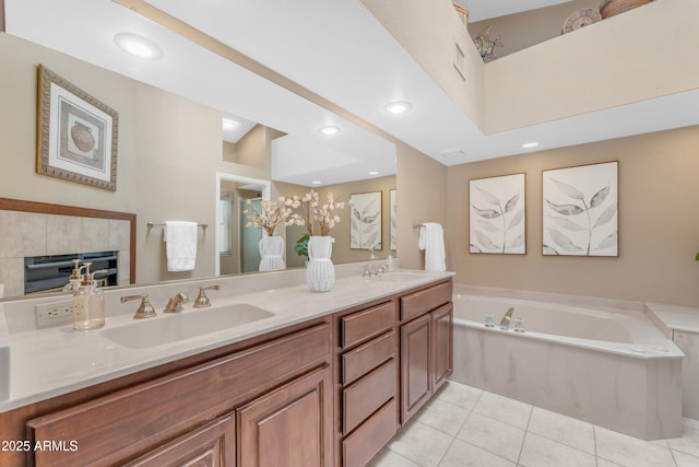 5822 W Abraham Ln, Glendale, AZ 85308 - bathroom featuring double vanity, tile patterned floors, a bath, and recessed lighting