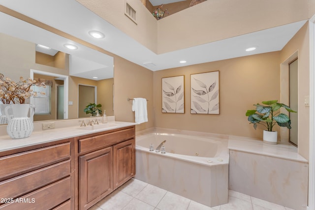 5822 W Abraham Ln, Glendale, AZ 85308 - full bath with vanity, a whirlpool tub, tile patterned floors, and recessed lighting