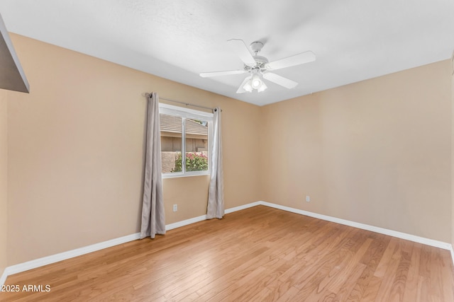 5822 W Abraham Ln, Glendale, AZ 85308 - empty room featuring light wood-type flooring and a ceiling fan