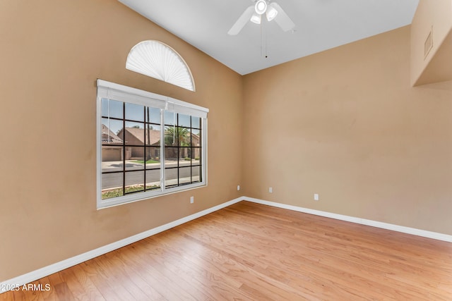 5822 W Abraham Ln, Glendale, AZ 85308 - empty room featuring plenty of natural light, wood finished floors, and ceiling fan