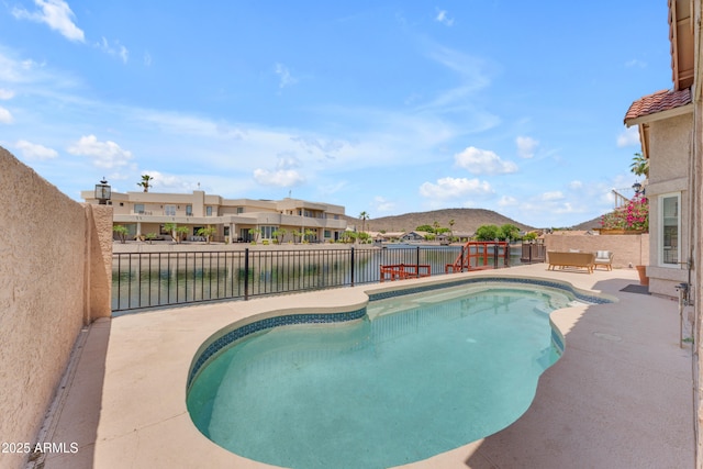 5822 W Abraham Ln, Glendale, AZ 85308 - view of swimming pool featuring a mountain view, a fenced backyard, and a patio