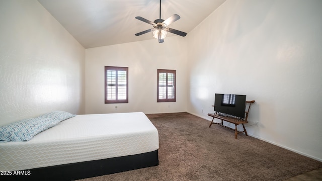 bedroom featuring ceiling fan, dark colored carpet, and high vaulted ceiling