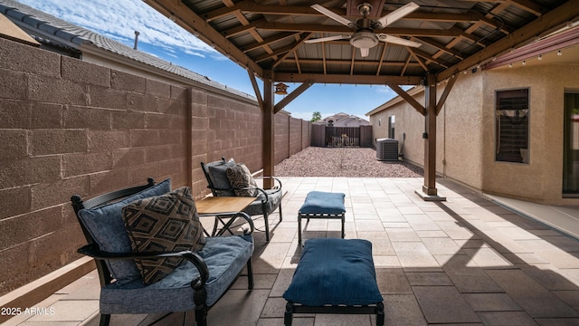 view of patio / terrace featuring ceiling fan, a gazebo, a fenced backyard, and central air condition unit