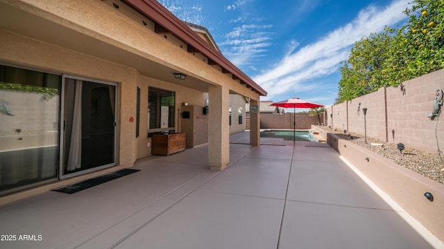 view of patio / terrace featuring a fenced backyard