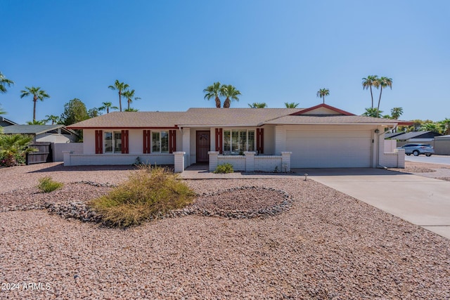 ranch-style home with a garage