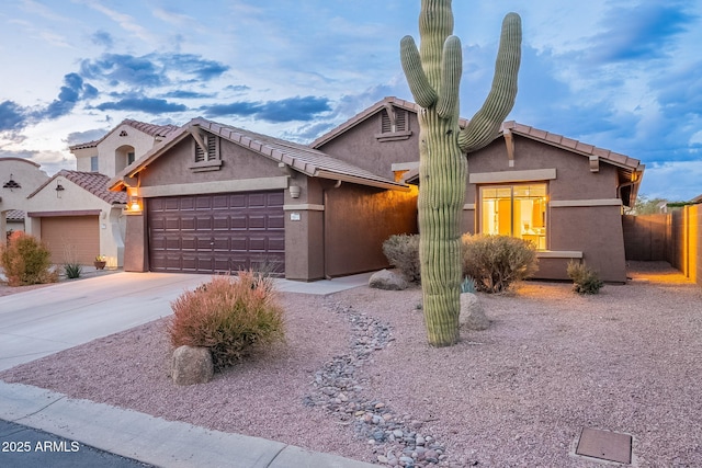 view of front of property featuring a garage