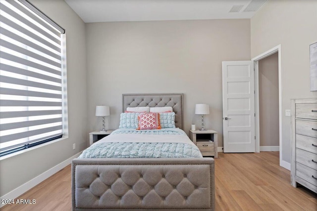 bedroom featuring light hardwood / wood-style flooring