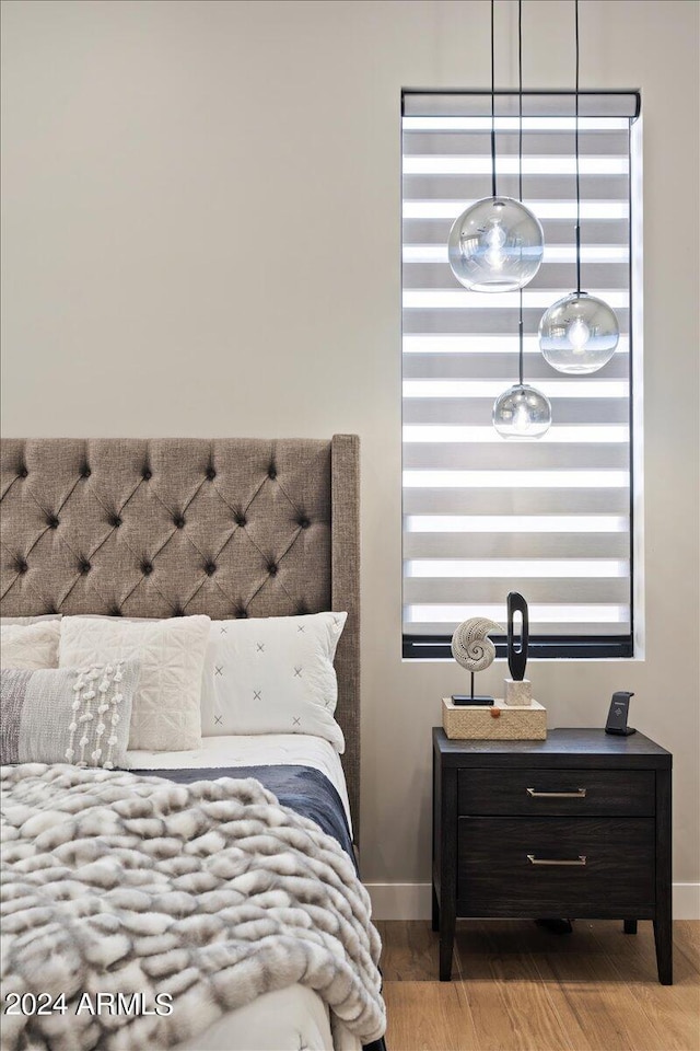 bedroom featuring light hardwood / wood-style floors