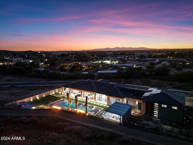 view of aerial view at dusk