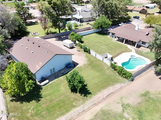 aerial view of residential area featuring a pool
