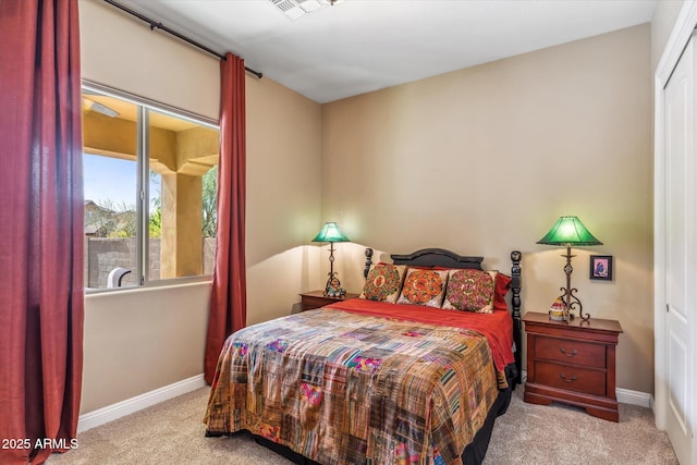 bedroom featuring carpet, visible vents, and baseboards