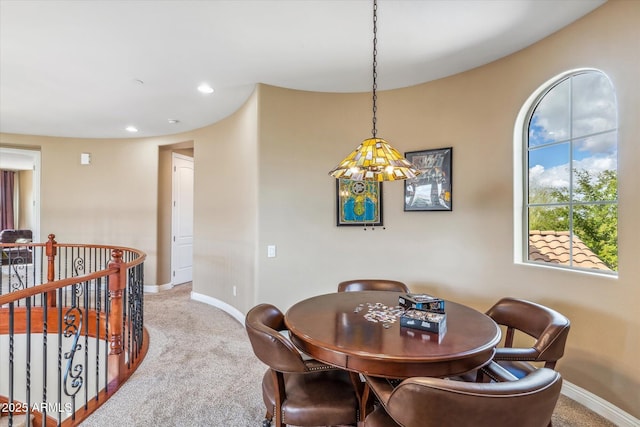 carpeted dining area featuring recessed lighting and baseboards