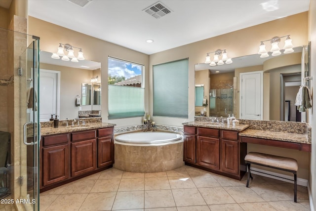 bathroom featuring a garden tub, a shower stall, visible vents, and a sink