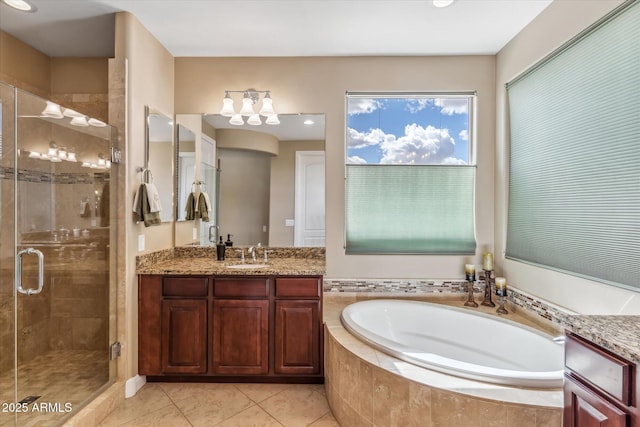 full bathroom with a garden tub, tile patterned floors, vanity, and a stall shower