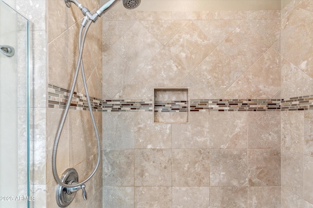 room details with a tile shower