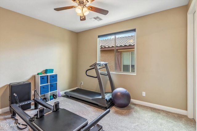 workout room featuring a ceiling fan, carpet flooring, visible vents, and baseboards