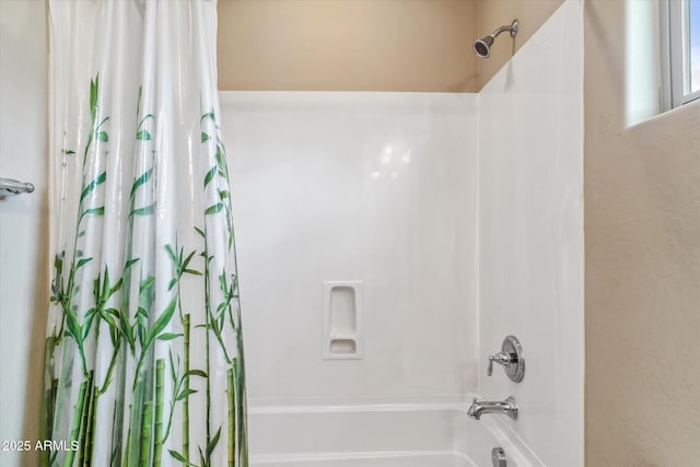 full bathroom with shower / tub combo