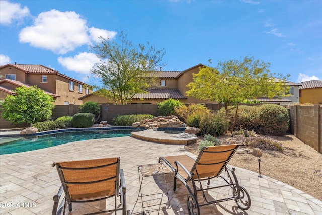 view of swimming pool featuring a patio area, a fenced backyard, and a fenced in pool