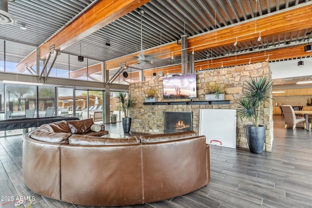 living area featuring wood finish floors and a fireplace