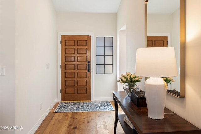 foyer entrance featuring hardwood / wood-style floors