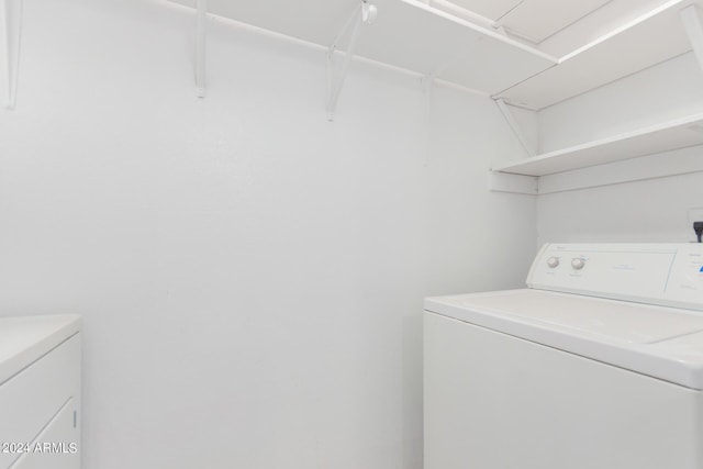 washroom featuring separate washer and dryer