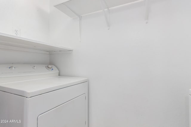 laundry area with washer / dryer