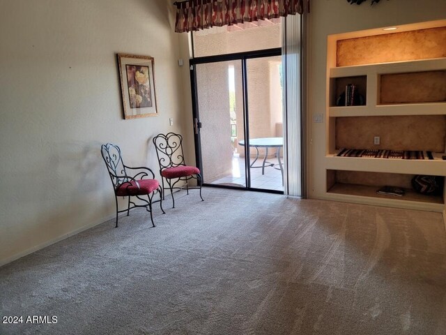 carpeted bedroom featuring ceiling fan, lofted ceiling, and access to outside