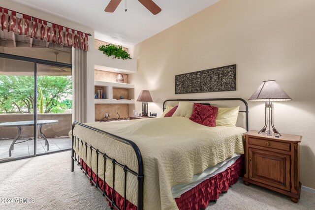 bedroom featuring ceiling fan and carpet